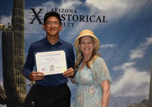 Dr. Kristen Rex presents Equality in History Award to Ethan Tsay